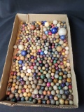 Flat of clay marbles