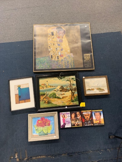 Collection of framed artwork with four DVDs