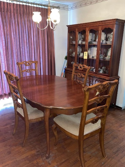 Maple Dining room table with 4 chairs, and glass front hutch
