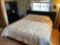 king size bed with black finish and matching armoire