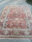 Hand made Persian rug. Shows wear in two corners.
