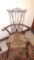 Older graceful spindled Windsor arm chair