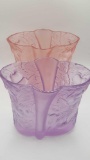 Two Art Deco themed cherry glass vases, one pink one purple
