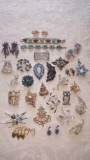 Dazzling costume jewelry lot: rhinestone pins, bracelets and earrings