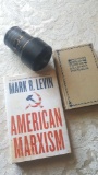 2 books and TAMRON camera lense, 90mm 1:2.8 macro