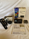 (2) Olympus digital cameras (Camedia C-720 ultra zoom, Stylus VG-165).