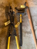 Post hole shovel, sledge hammer, barrel opener.