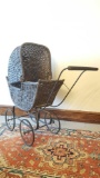 Antique wicker doll buggy