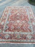 Hand made Persian rug. Shows wear in two corners.