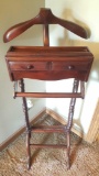 A gentleman's clothing butler stand