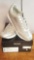 Never worn ladies metallic silver DKNY Arlie-slip on sneakers, size 8