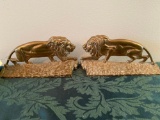 Pair of brass lion bookends, 8 3/4