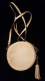 Shade of nude Michael Kors drum shaped purse with tassel