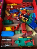 lot of 1960s plastic cars and toys
