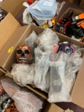 Two boxes of decorator items, skulls, cups and motorcycles