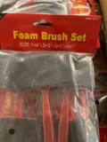 Three flats of foam brush sets