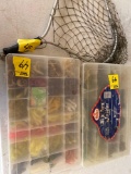 fishing net and two plastic organizers with tackle