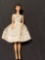 1958 (Roman numeral) Barbie doll brunette.