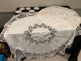 (2) Lace Table covers, (5) lace doilies.