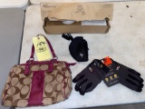 Coach purse, size XL gloves, gun holster, Pampered Chef ultimate mandolin food slicer.