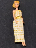 1958 (Roman Numeral) Barbie doll w/ pony tail.