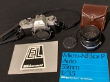 Nikkormat EL camera w/ Micro Nikki's lense.