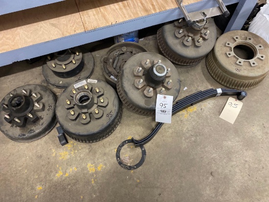 Assorted trailer drum hubs, some new, leaf spring