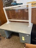 metal desk with plexiglass dividers