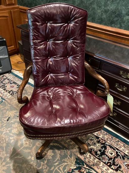 executive leather office chair swivels on wheels nail head trim