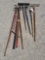 assortment of tools ? rakes, pitchforks, hoe, and more