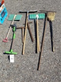 assortment of tools- shovels, pickaxes, broom, squeegee, Ames