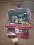 Tote of assorted batteries, broken sawzall and parts