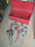 Assorted aluminum and metal pipe wrenches with tool box