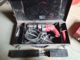 Milwaukee magnum drill with case