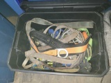 Tote of climbing gear, harnesses