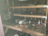 Contents of garage shelving, rims, bike tires and wheels, hardware, bender
