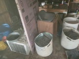 Contents of garage floor, live trap, barrels of slate, old air conditioner, pine cones