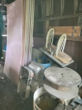 Foam boards, old sinks, barrels, wood ladder