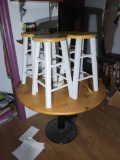Round table with 5 short stools