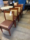 4 leather seated chairs.