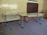 Three adjustable height rolling tables