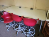 Adjustable height table and three rolling chairs