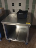 Stainless steel stand on casters, 32 inches wide