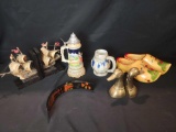 Steins, wood shoes, brass duck, nautical book ends