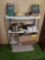 Plastic Shelf with Contents - Metal Pots, Radio w/Cords, and other Assorted Items