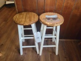 Pair of stools, one with Conestoga wagon