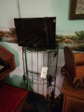 Metal western themed stand with Dynex 22inch flats-creen TV
