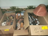 3 Boxes of western themed decor, banks, candle holders, houses, lamp with leather shade and more