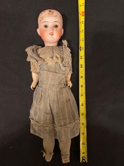 Old 15" bisque head doll w composition arms & legs.