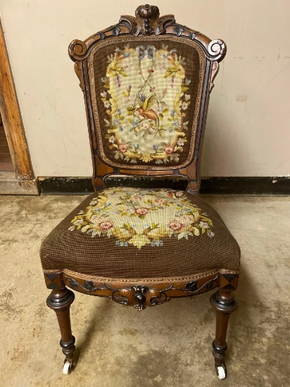 Victorian carved chair w/ needlepoint seat, 37.5" tall.
